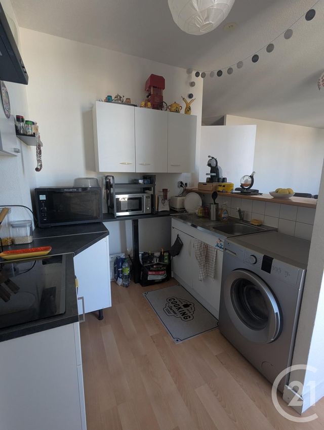 Appartement F4 à louer - 3 pièces - 93.8 m2 - CHATELGUYON - 63 - AUVERGNE - Century 21 Agence Girard
