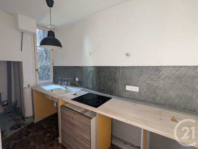 Appartement F1 à louer - 2 pièces - 63.09 m2 - RIOM - 63 - AUVERGNE - Century 21 Agence Girard